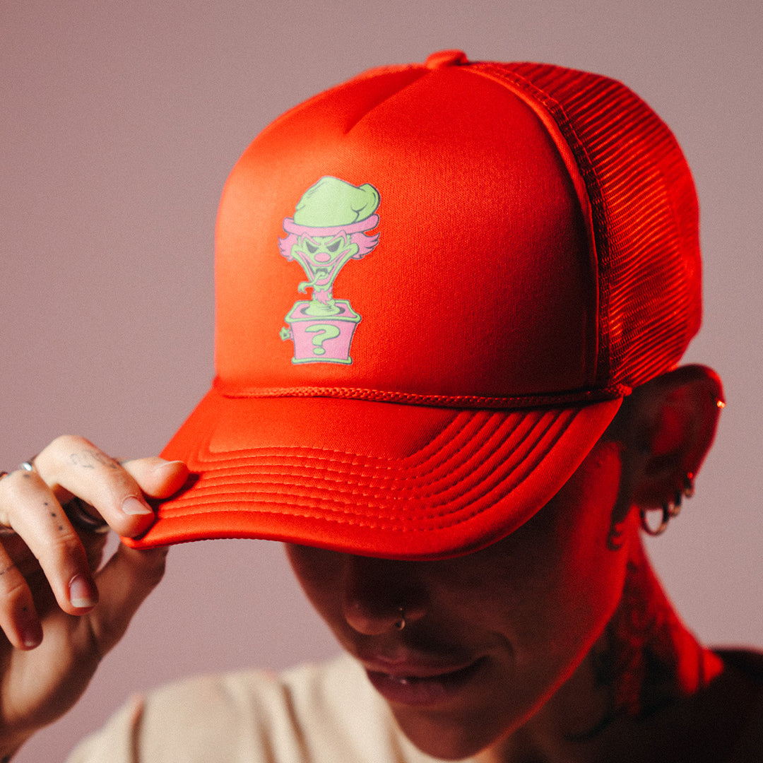 "Riddle Box" Trucker Hat In Neon Orange